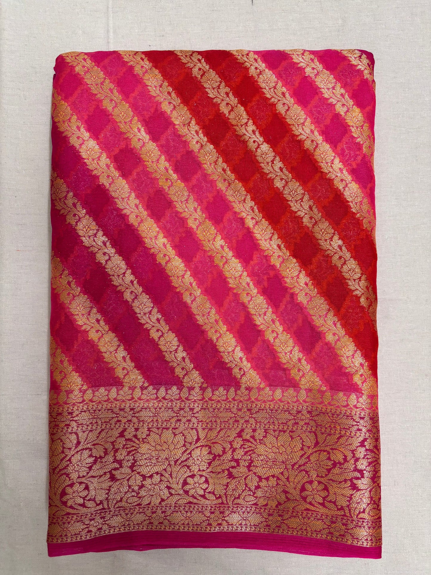 Arav Ethnics Leheriya Khaddi Georgette Benarasi