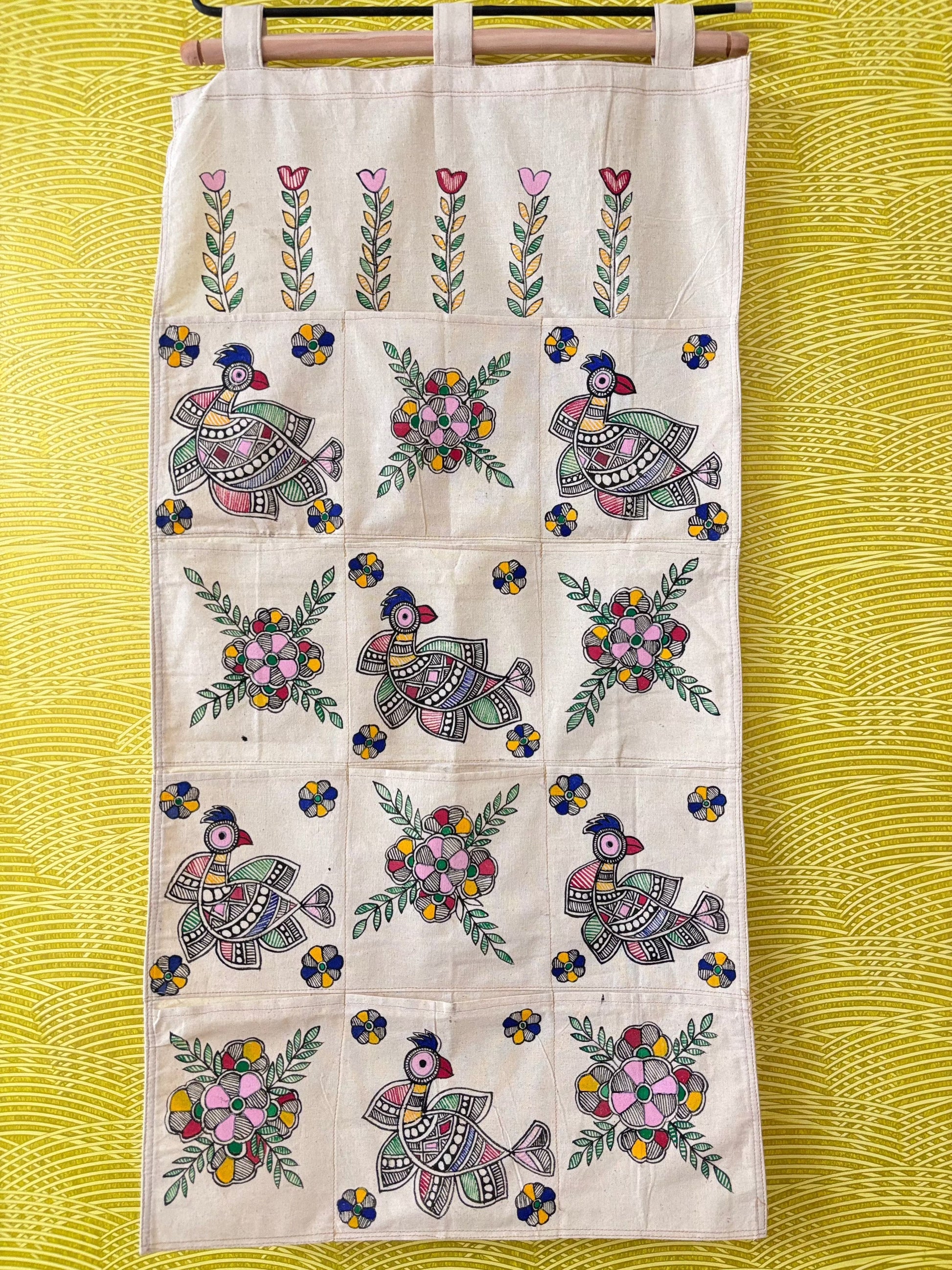 Arav Ethnics  Peacock Bloom – Madhubani Hand-Painted Wall Organizer
